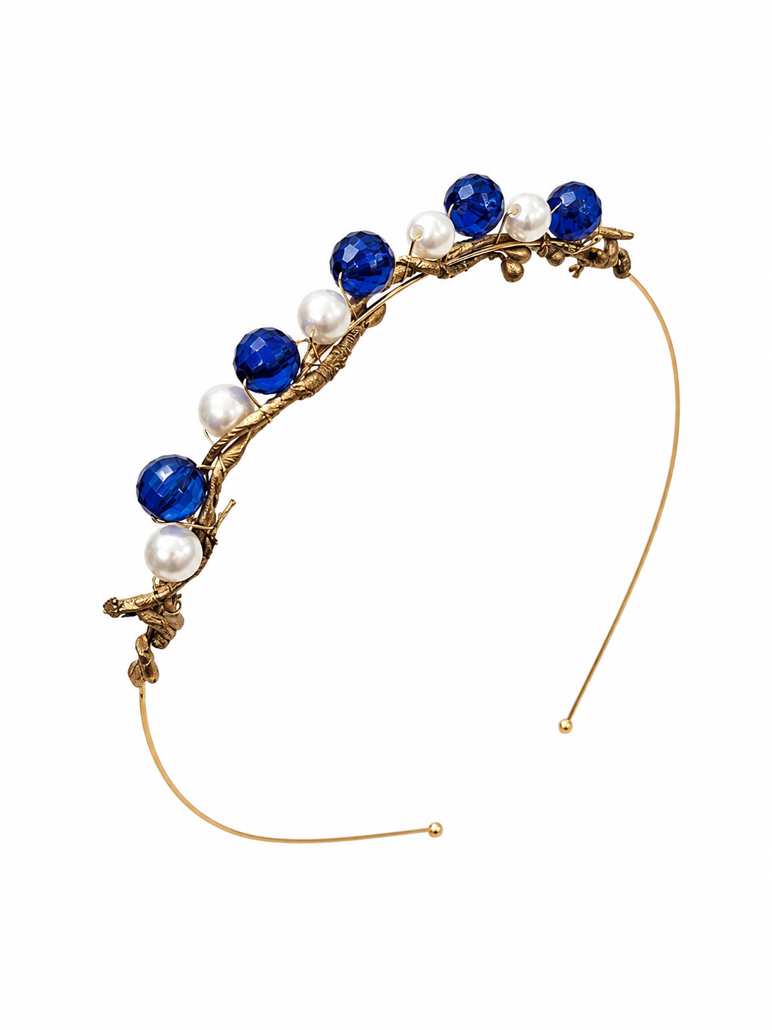 Decorative headband with blue and white beads on a white background