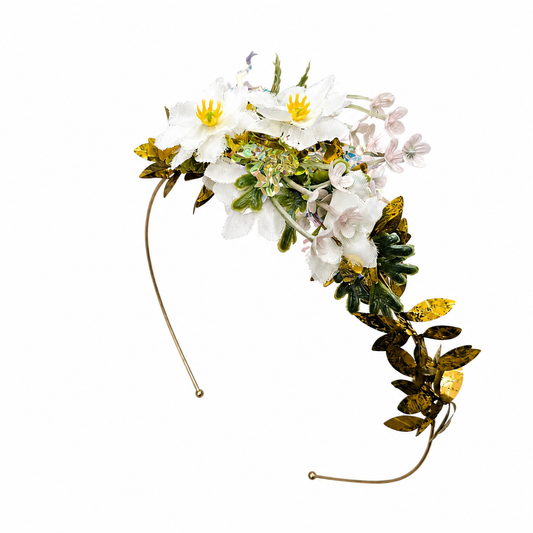 Handcrafted gold floral statement headpiece with artificial flowers and gold botanical accents on a lightweight gold-plated alice band