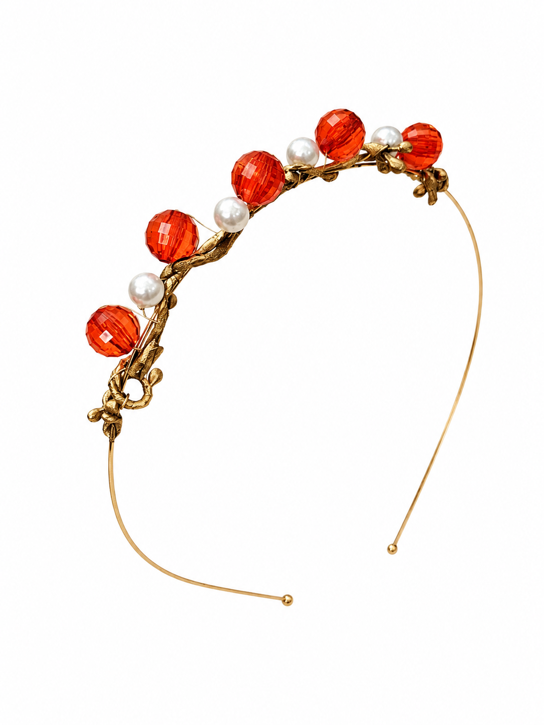 Decorative headband with red beads and gold accents on a white background